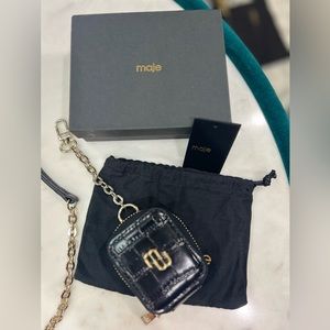 Maje AirPods case on chain